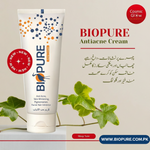 Biopure Antiacne Cream tube with green leaves on a beige background